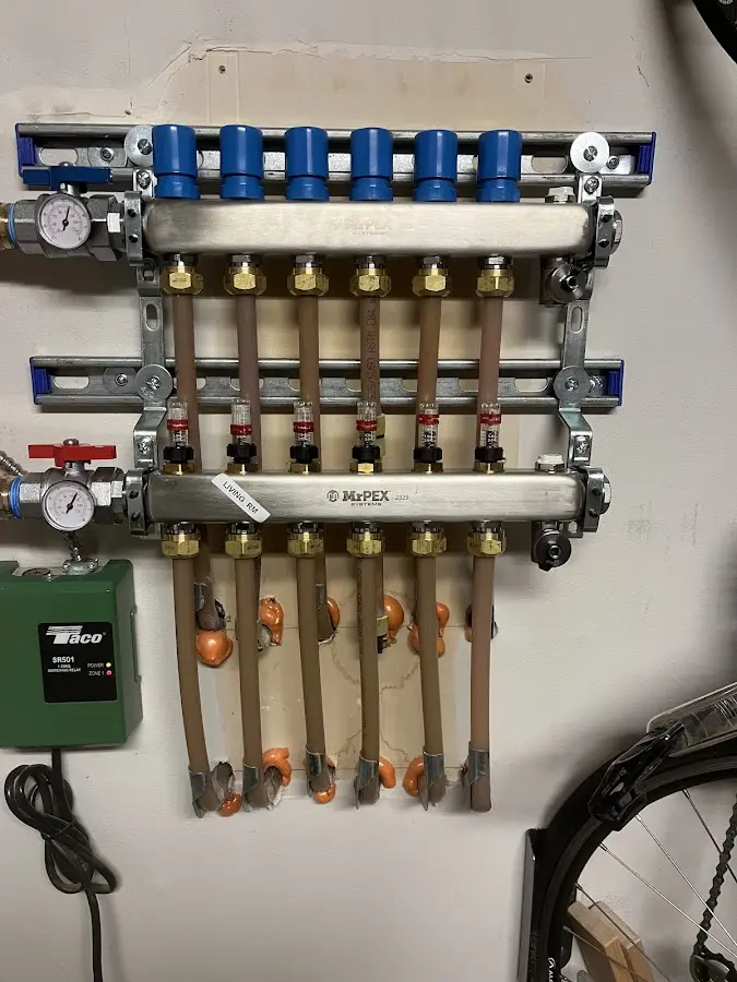 Plumber performing Leak Detection at a residential property in South Kensington